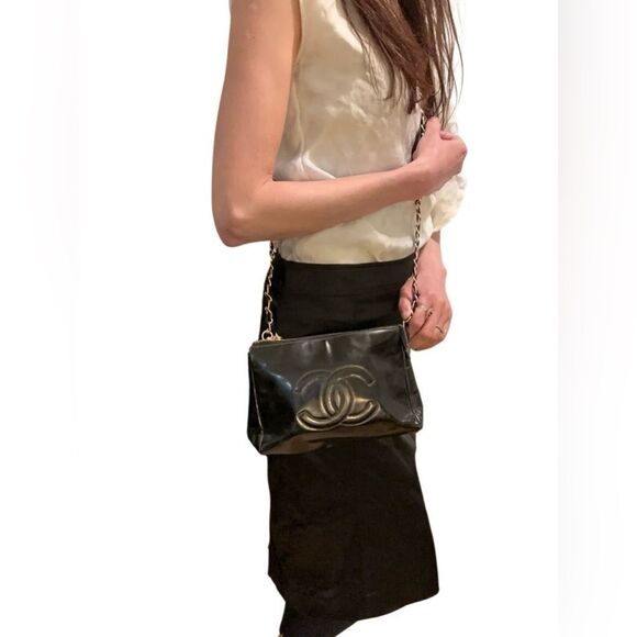 Chanel Black Pouch Bag with Iconic Logo added chain
